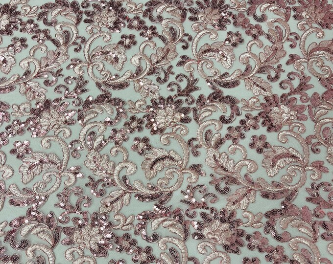 Pink metallic corded embroider flowers with sequins on a mesh lace fabric-prom-sold by the yard.
