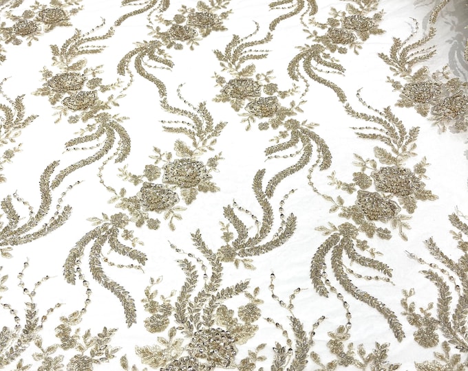 Light Gold  flowers embroider and heavy beaded on a mesh lace fabric-sold by the yard.