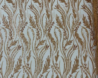 Rose gold Festival Design Embroider and heavy beading on a mesh lace-sold by the yard.