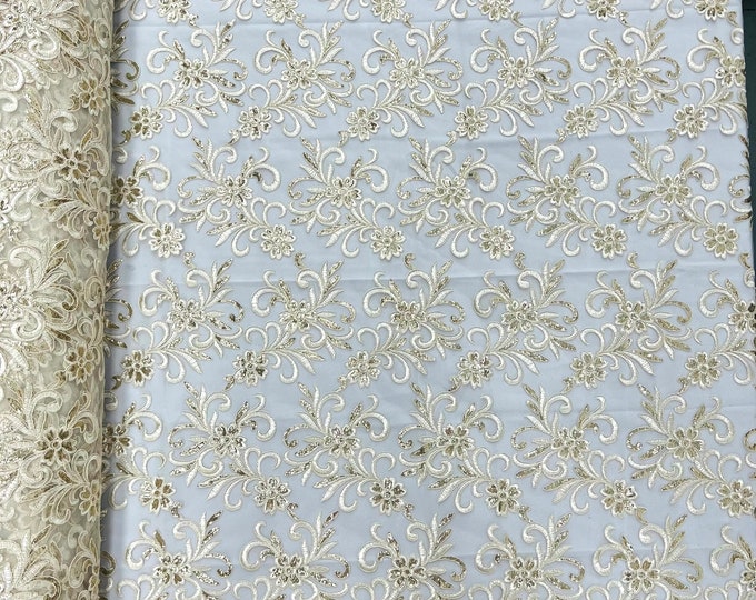 Ivory corded flowers embroider with gold sequins on a mesh lace fabric-sold by the yard-