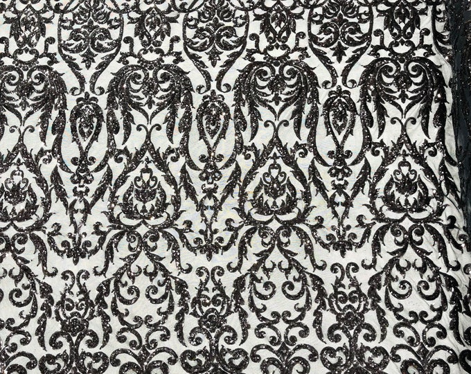 Black shiny King Damask sequin design on a 4 way stretch mesh fabric-prom-sold by the yard.