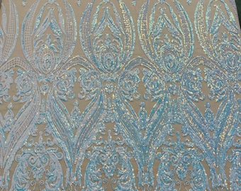 Aqua iridescent empire damask design with sequins embroider on a D/Nude 4 way stretch mesh fabric-sold by the yard.