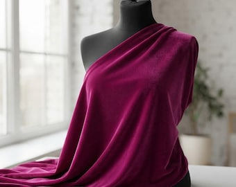 Tela elástica de terciopelo magenta de 58" de ancho para disfraces. Se vende cortada a medida.
