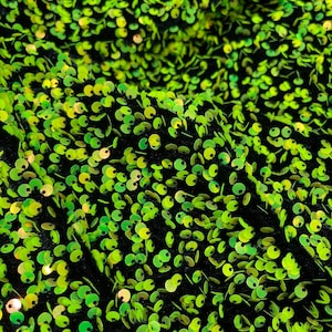 Neon green Iridescent On Black stretch velvet with luxury sequins all over 5mm shining sequins 2-way stretch, sold by the yard.