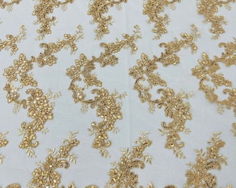 Gold flower lace corded and embroider with sequins on a mesh-Sold by the yard.