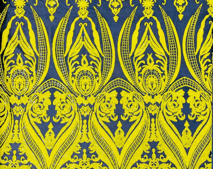Yellow empire damask design with sequins embroider on a black 4 way stretch mesh fabric-sold by the yard.