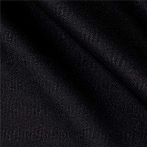 May include: Close-up of a black fabric with a subtle sheen. The material is tightly woven, creating a smooth, dark surface. The fabric appears to be draped, with visible folds and shadows adding depth to the image.