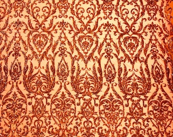 Burnt Orange Holographic King Damask sequin design on a 4 way stretch mesh fabric-prom-sold by the yard.