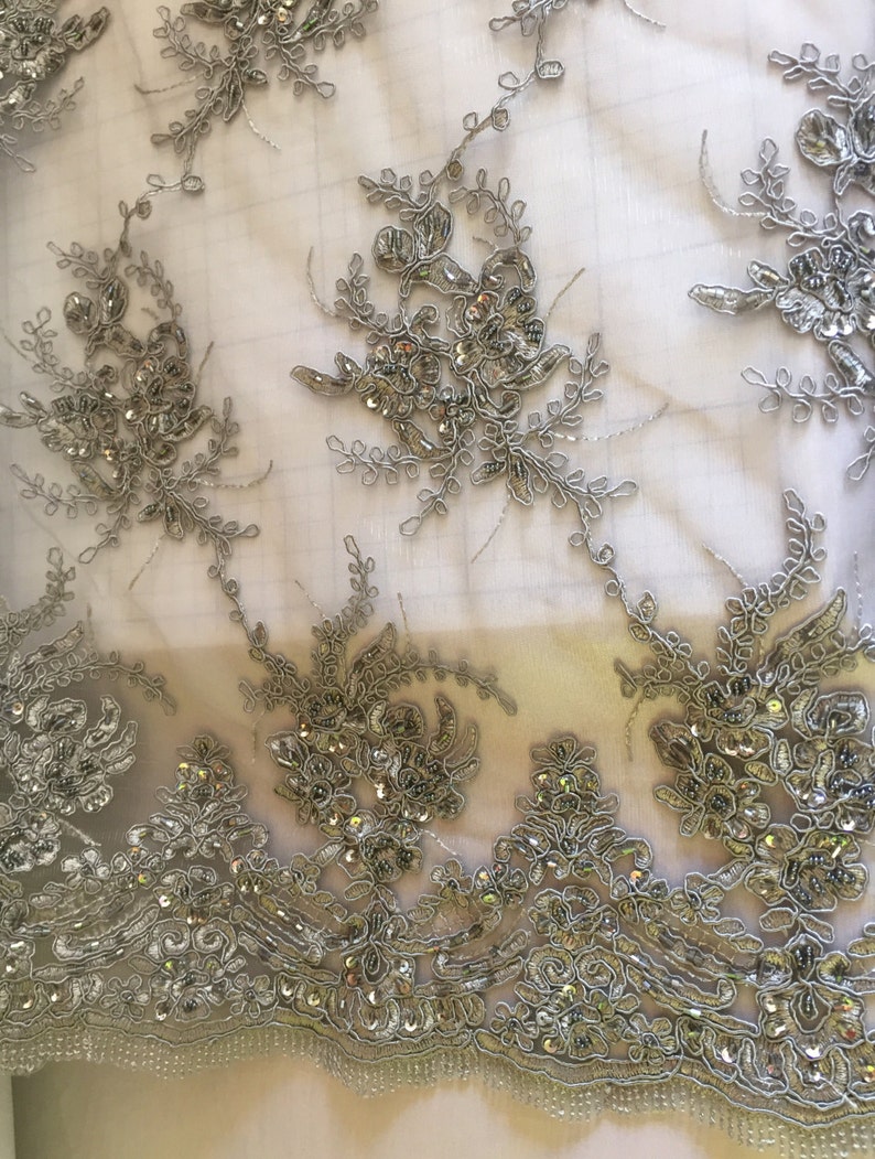 Gray marvy flower design embroider with glass beads and sequins on a mesh lace yd