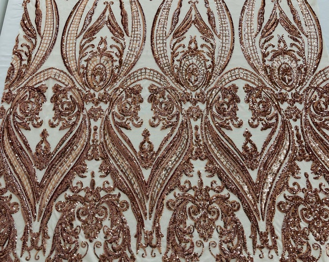 Rose gold empire damask design with sequins embroider on a nude 4 way stretch mesh fabric-sold by the yard.