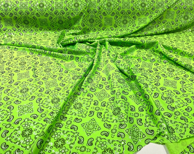 Neon Green metallic bandanna print on a stretch tricot spandex fabric- Sold by the yard.