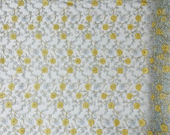 Light blue multi color gold metallic floral design embroider on a blue mesh lace-dresses-sold by the yard.