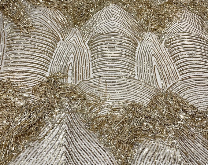 Gold shiny fringe sequins design on a 4 way stretch mesh fabric-prom-sold by the yard.