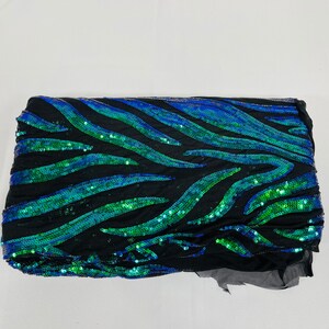 Neon Yellow iridescent phoenix feather design with sequins embroider on a Yellow 4 way stretch mesh fabric-sold by the yard. main image 0