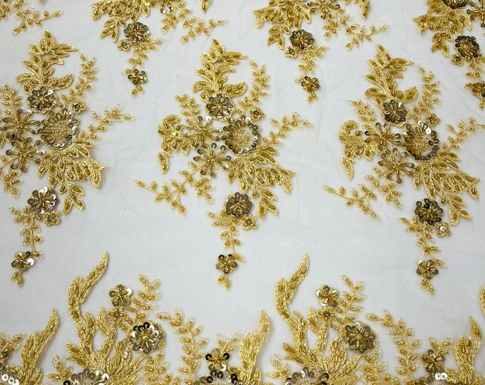 Gorgeous Gold French design embroider and beaded on a mesh lace. Wedding/Bridal/Prom/Nightgown fabric.