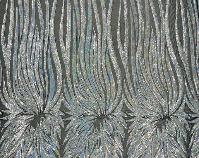 Silver Holographic sequin Wings design on a black 4 way stretch mesh fabric- prom-nightgown-by the yard-free shipping in the USA.