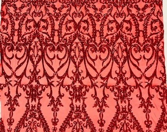 Red shiny sequin damask design on a 4 way stretch mesh-sold by the yard.