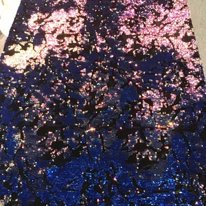 Royal blue iridescent and reversible sequins embroidery on a black 4 way stretch velvet-dresses-fashion-sold by the yard-free shipping USA.