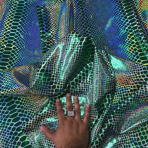 Green iridescent dragon scales print on a 2 way stretch nylon spandex-dresses-lwggings-decorations-prom-nightgown-sold by the yard.