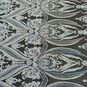 Empire damask design with sequins embroider on a black 4 way stretch mesh fabric-sold by the yard. Green Iridescent