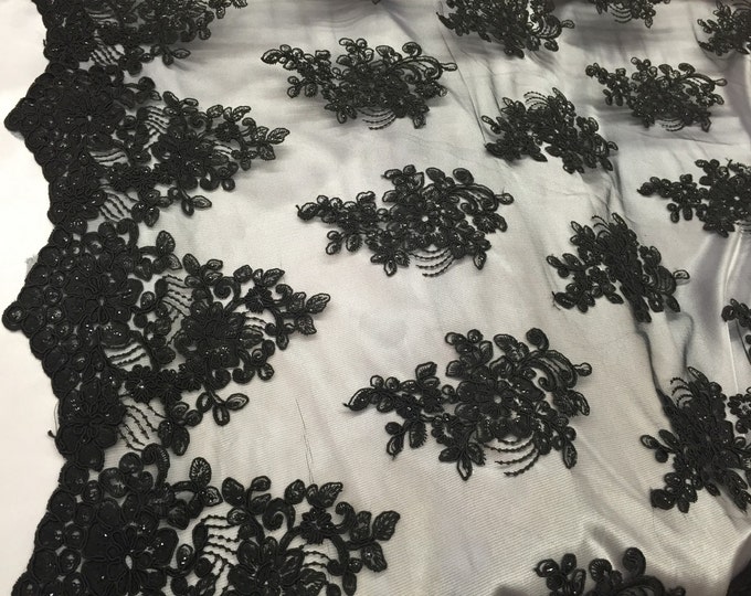 Black flower lace corded and embroider with sequins on a mesh. Wedding/bridal/prom/nightgown fabric. Sold by the yard.