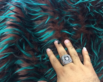 3 tone spikes faux fur- brown/hunter green/black. Shaggy faux fur sold by the yard.