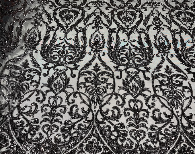 Black shiny sequin damask design on a black 4 way stretch mesh-prom- sold by the yard.