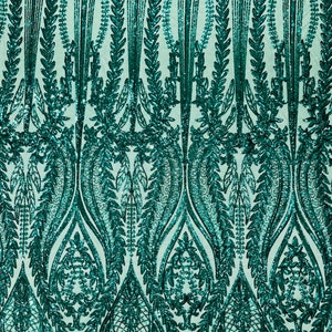 Emerald Green damask design with sequins embroider on a 4 way stretch mesh fabric.