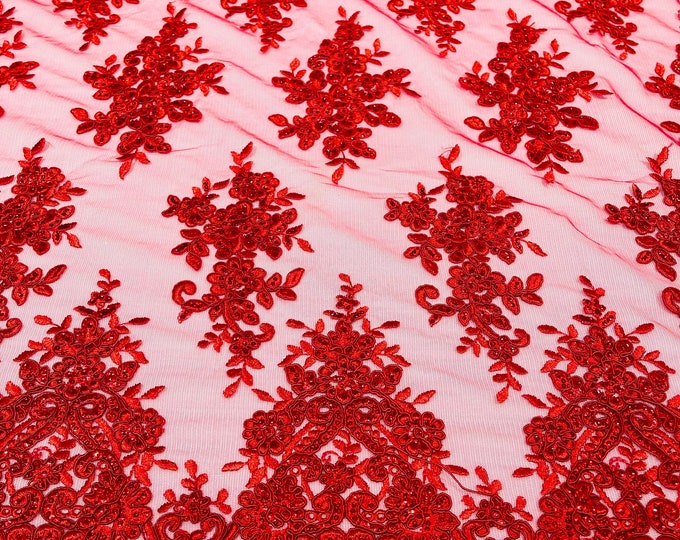 Red flower lace corded and embroider with sequins on a mesh-Sold by the yard.