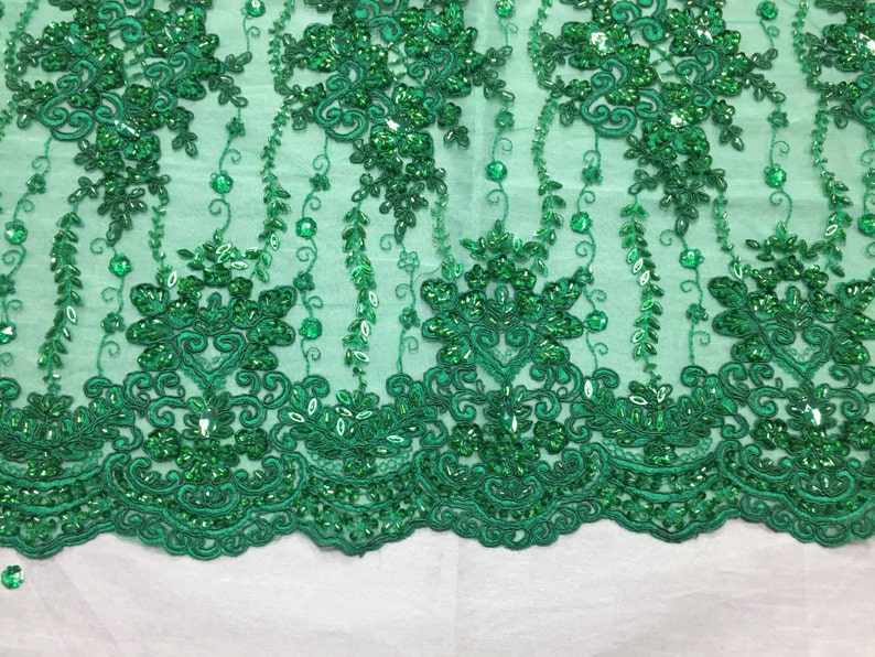 yard Green magnificent design embroider and heavy beaded on a mesh lace