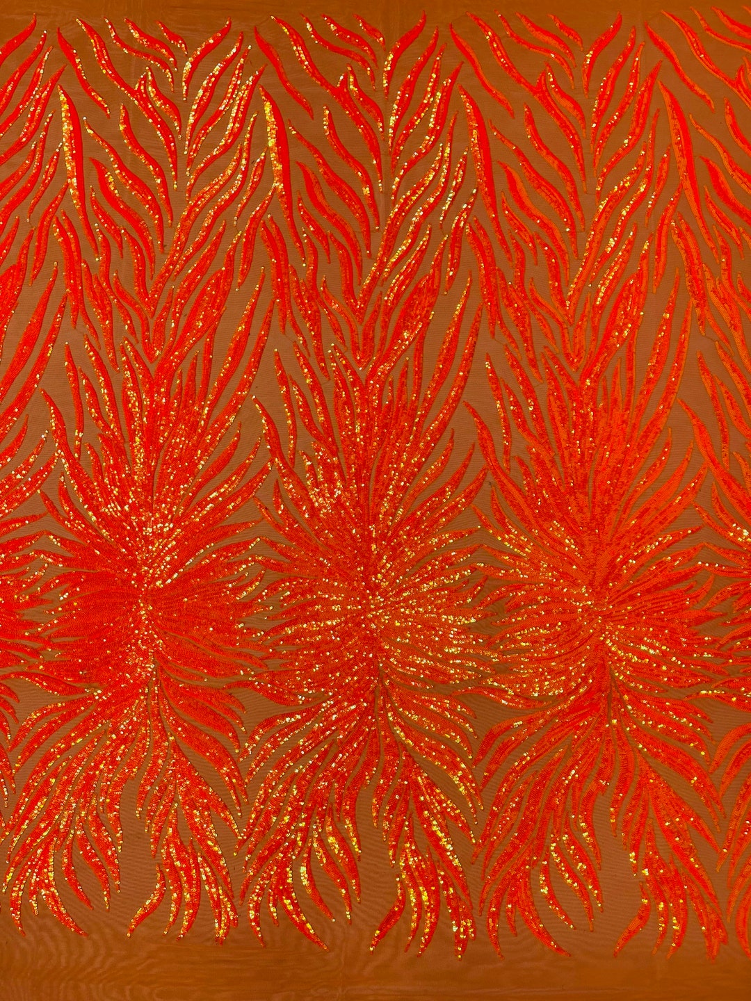 Neon lime green iridescent phoenix feather design with sequins embroider on a 4 way stretch mesh fabric-sold by the yard. main image 0