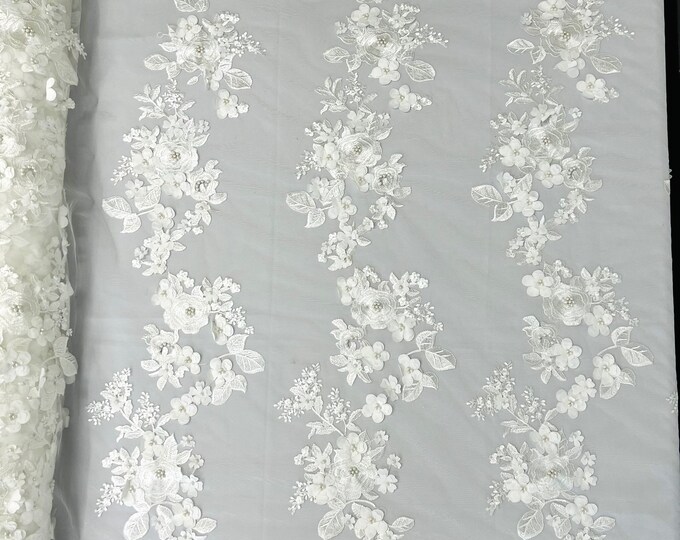 Ivory Diana 3d floral design embroider with pearls in a mesh lace-sold by the yard.