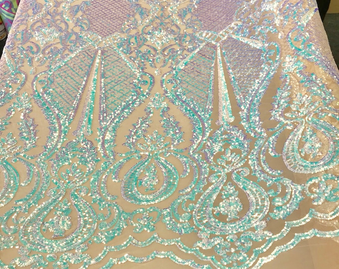 Aqua princess design iridescent sequins embroidery on a 4 way stretch nude mesh-dresses-fashion-apparel-prom-nightgown-sold by the yard.