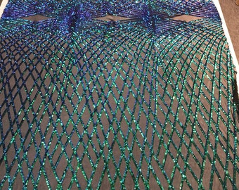 Iridescent Green Sequins diamond design embroidery on a black 4 way stretch power mesh-dresses-fashion-apparel-prom-nightgown-Sold by yard.