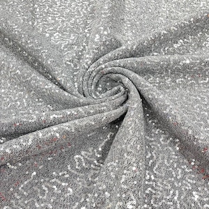 Silver Metallic Tinsel Stretch Lurex Fabric With Sequins/58 Wide.