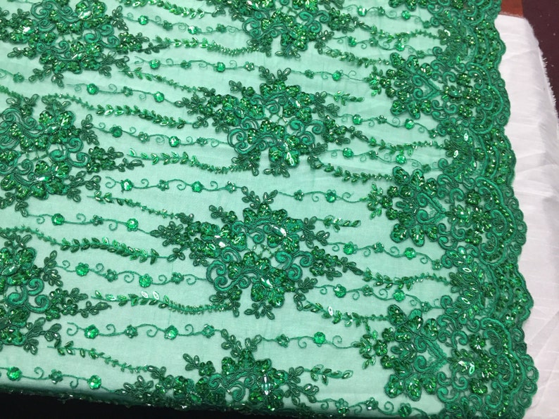 yard Green magnificent design embroider and heavy beaded on a mesh lace