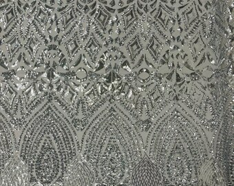 Silver shiny diamond design with sequins on a Silver 4 way stretch mesh-prom-nightgown-sold by the yard-free shipping in the USA.