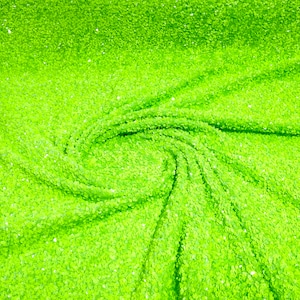 Neon lime green 5mm sequins on a lime stretch velvet 2-way stretch, sold by the yard.
