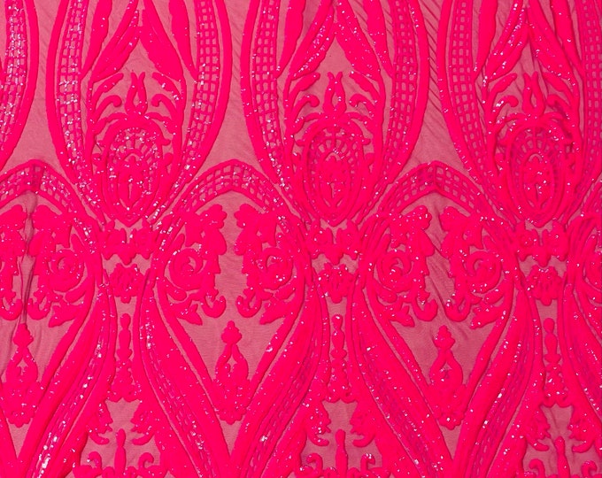 Hot Pink empire design embroider with glossy sequins on a 4 way stretch mesh--sold by the yard.NEW!