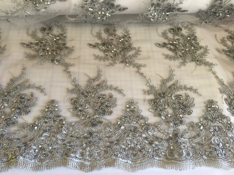 Gray marvy flower design embroider with glass beads and sequins on a mesh lace yd