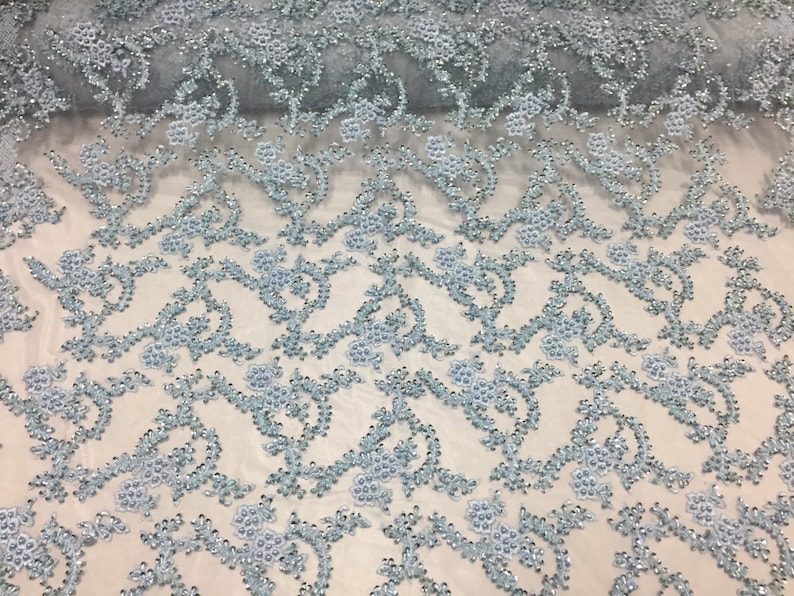 Majestic light Blue Shinny vine design embroider and heavy beading on a mesh lace-prom-nightgown-decorations-dresses-sold by the yard.