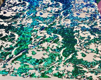 Green-black iridescent sequins on a 4 way stretch white velvet-prom-nightgown-sold by the yard-free shipping in the USA-