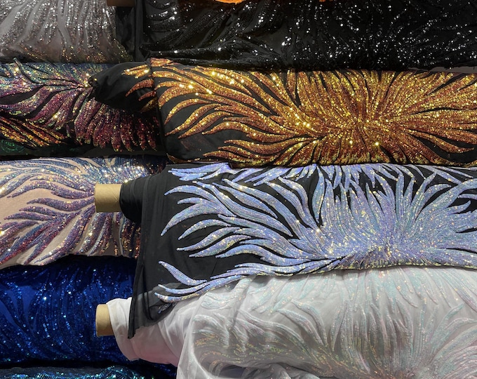 Phoenix feather design with sequins embroider on a red 4 way stretch mesh fabric-sold by the yard.