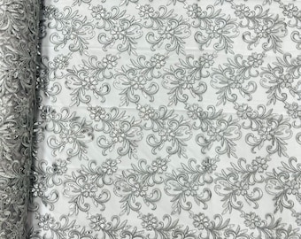 Silver/gray corded flowers embroider with sequins on a mesh lace fabric-sold by the yard-