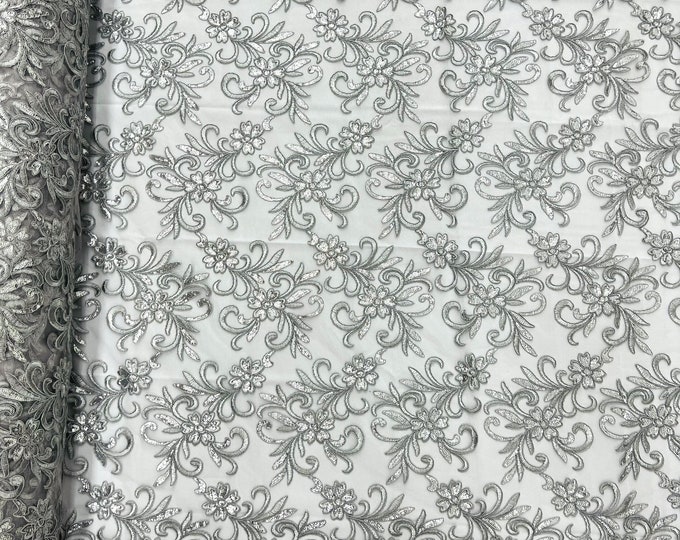 Silver/gray corded flowers embroider with sequins on a mesh lace fabric-sold by the yard-
