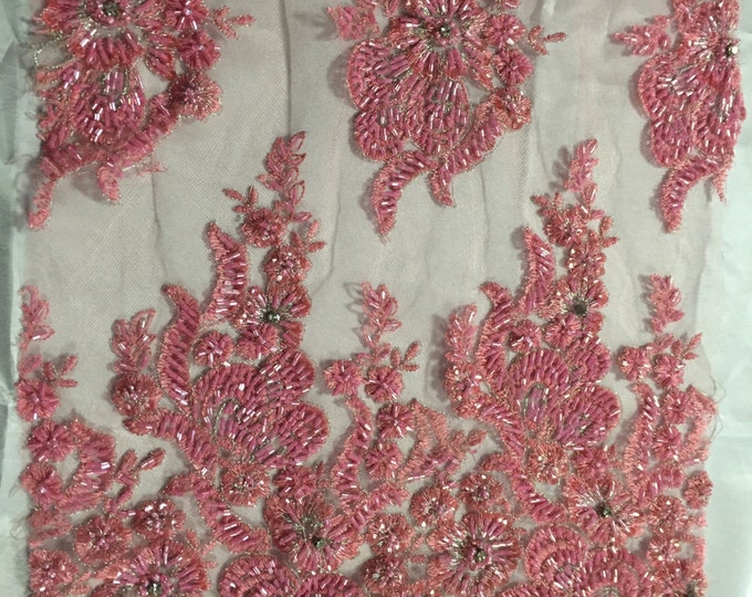 Coral flowers embroider and heavy beaded on a mesh lace fabric-sold by the yard-