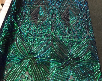 Green geometric diamond design with shiny iridescent sequins on a black 4 way stretch mesh-dresses-prom-nightgown-sold by the yard.