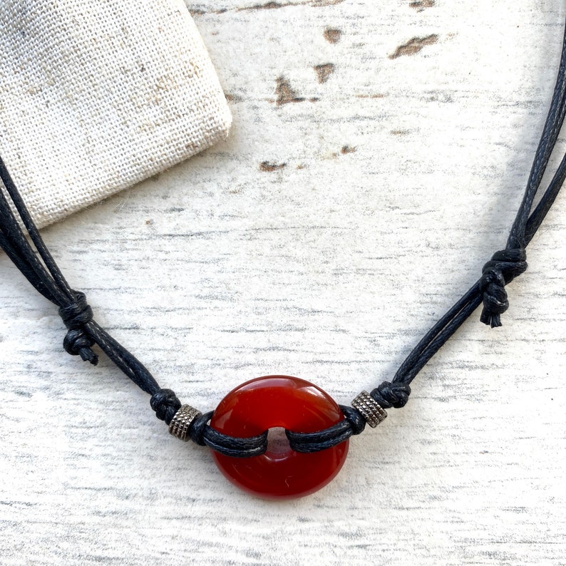 Moss agate choker , black adjustable necklace cotton cord, gemstone gift for a gothic teen. Crystal pendant Worn for courage & communication Carnelian