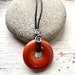 see more listings in the 30mm donut pendants section