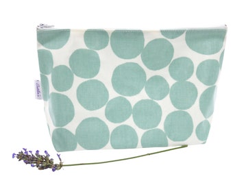 Stand alone oilcloth washbag. Cosmetic purse. Vanity case. Green Bubble Design. Make up bag.